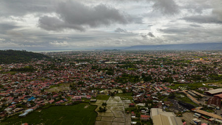 Aerial view of Padang city with residential areas and houses. Sumatra, Indonesia.の写真素材