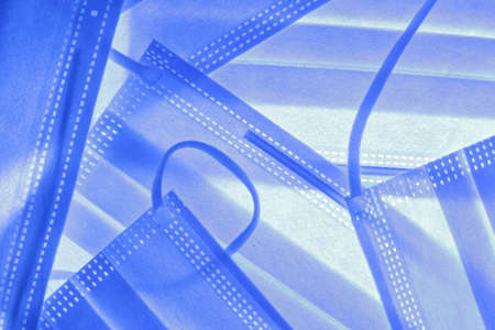 Surgical mask with rubber ear straps. Typical 3-ply surgical mask to cover the mouth and nose....