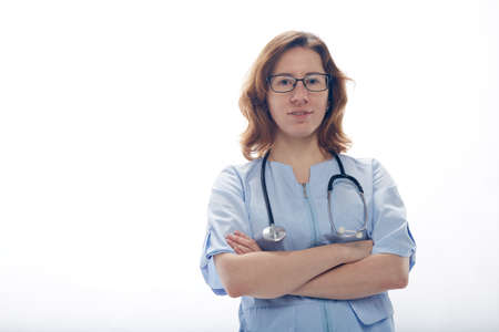 Doctor woman standing isolated on white background