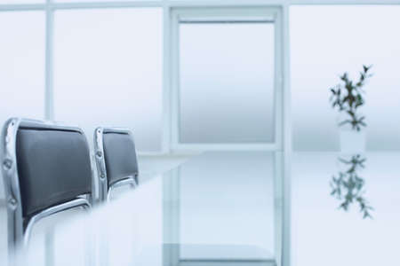 Spacious, bright, modern office space. Glass table. A place to learn at work.の写真素材