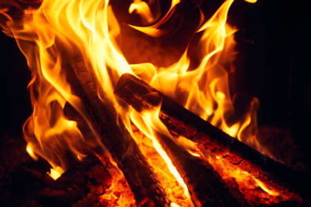 A fire burns in a fireplace, Fire to keep warm.の写真素材