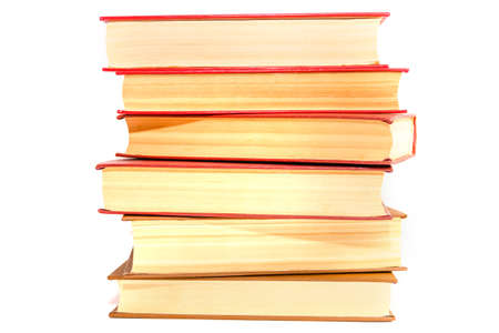 stack of books with a red cover isolated on white background.の写真素材