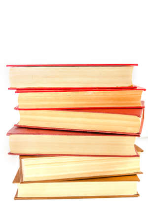 stack of books with a red cover isolated on white background.の写真素材
