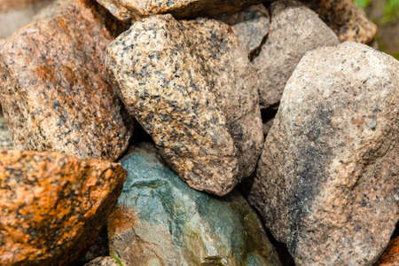 a lot of wet big stones after the rain.の写真素材