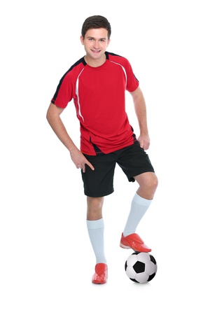 soccer player with a ball on white backgroundの写真素材