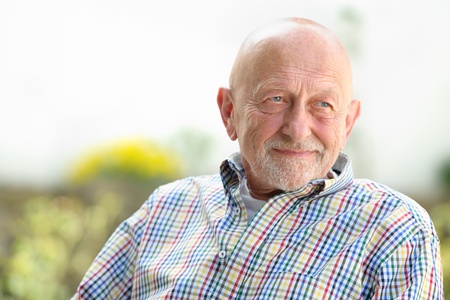 Portrait of senior man outdoors