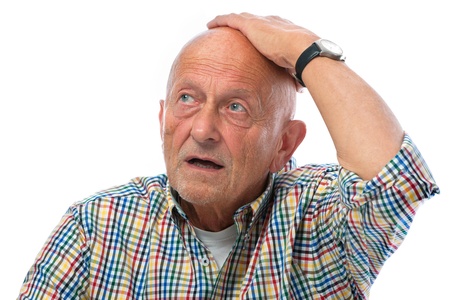 portrait of astonished senior man - isolated over white