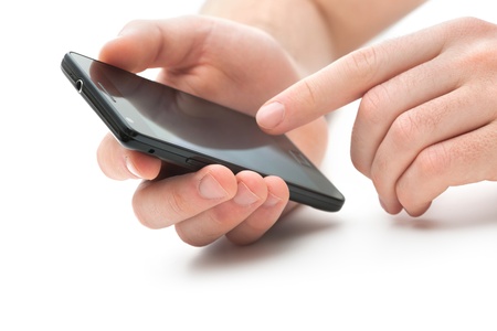 Hand touching screen on modern mobile smart phone