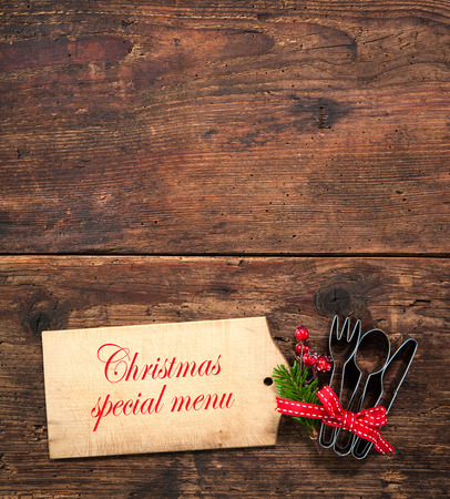 Christmas menu card for restaurants on wooden backgroundの写真素材