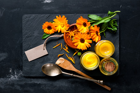 Homemade calendula ointment and oilの写真素材