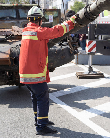 Destroyed military equipment in a military conflict. Broken tanks, combat vehicles and other burnt...