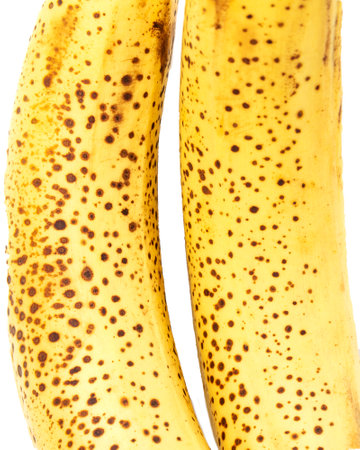 Yellow color, banana texture - micro image. Texture of ripe organic banana closeupの写真素材