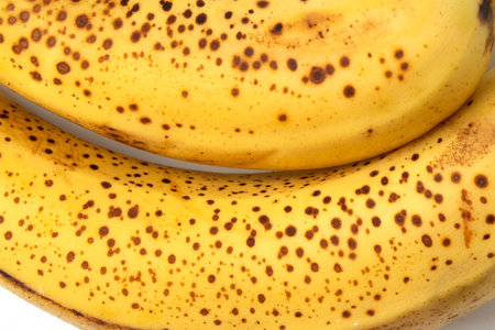 Yellow color, banana texture - micro image. Texture of ripe organic banana closeupの写真素材