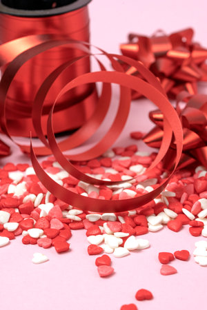 Valentine's hearts with red bows and red curly ribbon. Valentine's Dayの写真素材