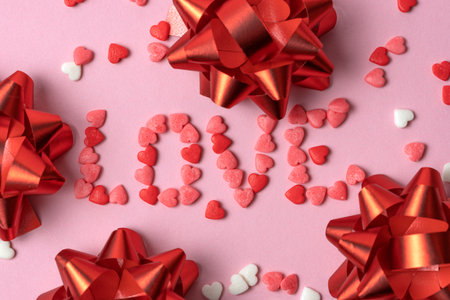 Valentine's hearts with red bows and red curly ribbon. Valentine's Dayの写真素材