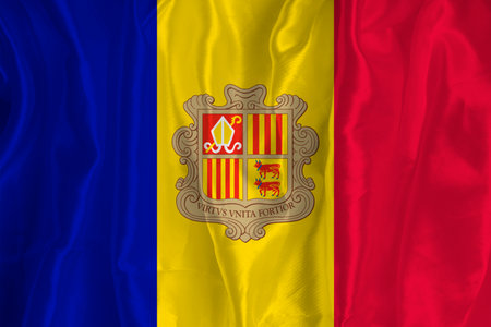 The Andorran flag on a silk background is a great national symbol. Fabric texture The official state symbol of the country. Andorran flag backgroundの写真素材