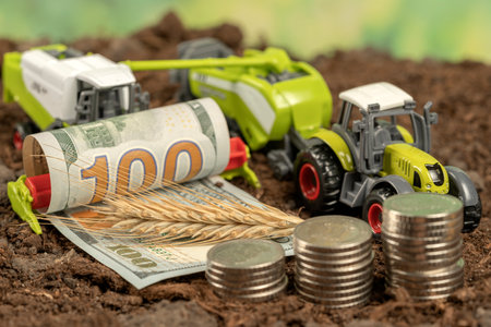 Combine harvester in the garden. The concept of harvesting and making money on agricultureの写真素材