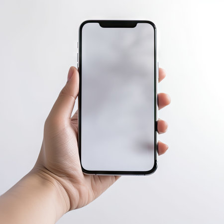 Blank Screen Mobile Phone in Hand on White Background - Realistic Photography for Web and Landing Pages. Generative AIの素材