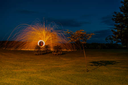 Burning steel wool in the nephew's farm. cool joke.の写真素材