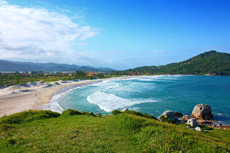 FERRUGEM, SANTA CATARINA, BRAZIL.Panoramic view of Ferrugem beach from the top of a hill.の写真素材