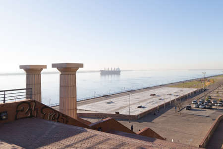 ROSARIO, ARGENTINA - JULY 16, 2019: The columns of Spain Park in foreground, at the background a...