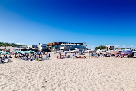 CARILO, BUENOS AIRES, ARGENTINA - JUANARY 09, 2023: Panoramic view of Carilo Beach. The people enjoying the beach in a sunny summer day on the south atlantic coast.のeditorial素材