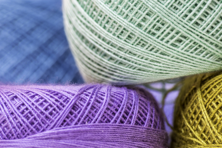 Rows of colorful yarns used for crochet