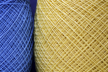 Close up of blue and yellow yarnsの写真素材