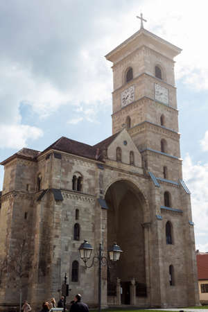 Alba Iulia, Romania - March 13, 2016: Tourists near the catholic cathedral in Alba Iulia, Romaniaのeditorial素材