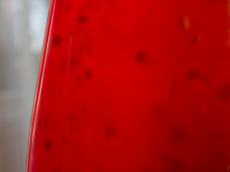 Bottle of red thai sauceの写真素材