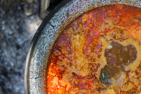 Gulyas stew boiling in a cauldronの写真素材
