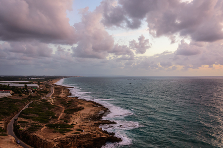 Picturesque view of beautiful cloudy sky at sunset on calm sea.の写真素材