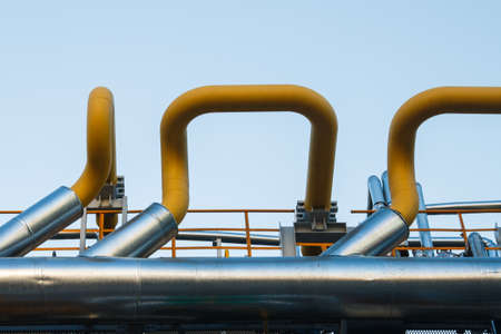 Industrial factory, steel pipelines, tubes at brewery production. Large workshop with tools equipmentの写真素材