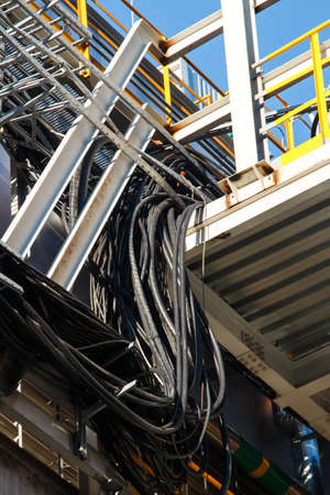 Industrial factory, steel pipelines, tubes at brewery production. Large workshop with tools...