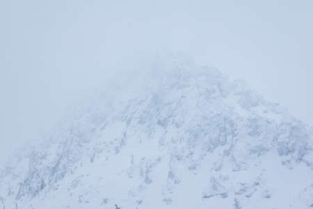 Landscape with mountains, forest and snowfield. Nature park Taganai in winterの写真素材