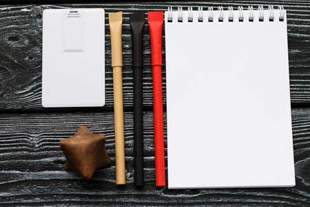 Corporate branding mockup template, isolated on dark wooden background.
