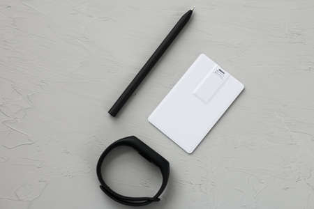 Photo of blank stationery set on wood background. Envelope, business cards, pencil, and A4 paper....