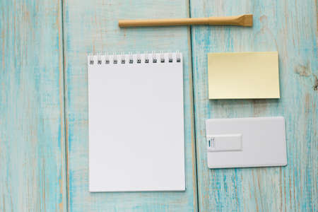 Corporate branding mockup template, isolated on blue wooden background.の写真素材