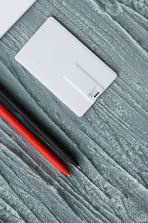 Corporate branding mockup template, isolated on wooden and leather background.