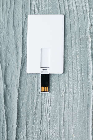 Blank white plastic wafer usb card design mockup.Visiting flash drive namecard mock up. Call-card disk souvenir presentation. Flat wallet credit stick adapter.の写真素材