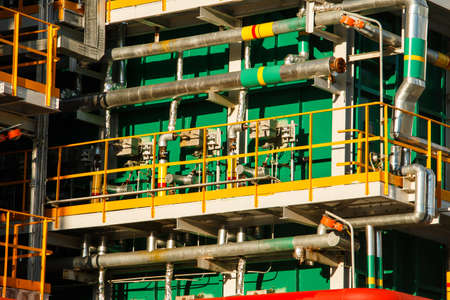 Industrial factory, steel pipelines, tubes at brewery production. Large workshop with tools equipmentの写真素材