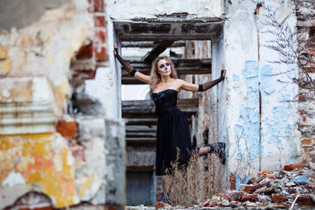 Zombie woman or ghost death with blood on house of ruin nightmare, horror of scary fear on hell is monster devil in halloween festival.の写真素材