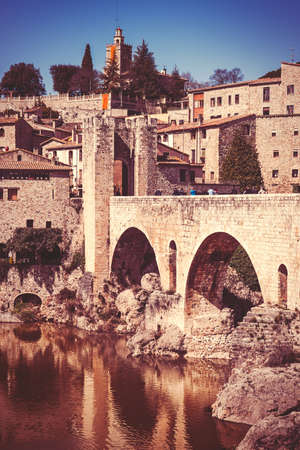 View of Besalu, small and nice medieval village in Girona. Vintage edition.の写真素材