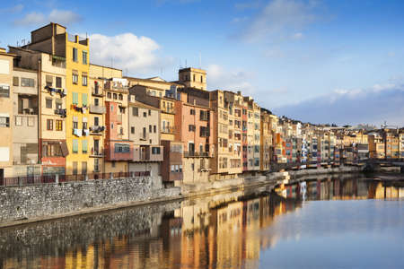 Famous and picturesque view of the Girona river with it's colourful houses.の写真素材