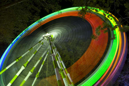 Great ferris wheel in a deep night fun fair.の写真素材