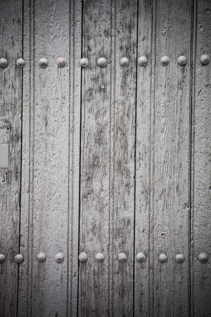 Old and wasted door panel making abstract background.の写真素材