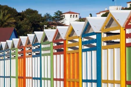 Row of summer beach cabins.の写真素材