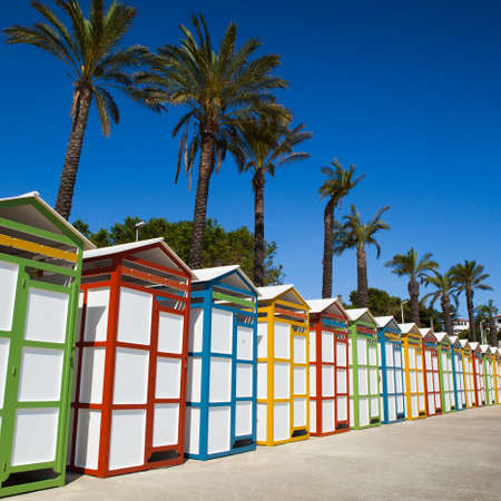Row of summer beach dressing rooms in Costa Brava, s'Agaro beach. Girona.の写真素材