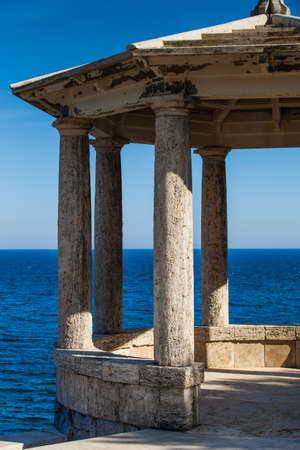 View of a mediterranean gazebo in Costa Brava, in "CamÃ­ de Ronda" a small pathway near the sea. Vertical format.の写真素材
