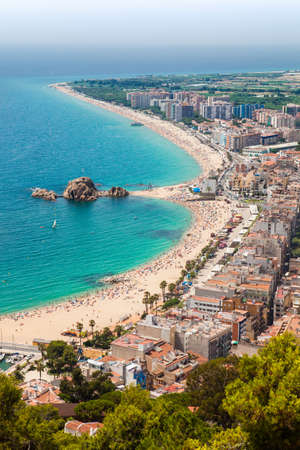 Aerial view of the seaside of Blanes in summertime. Costa Brava, Girona.